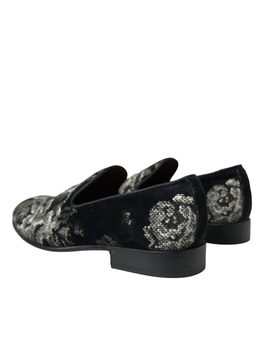 Pair of black velvet shoes with floral embroidery on heels and toes