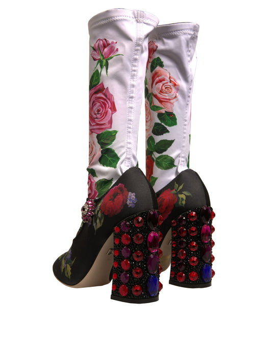 Pair of boots with floral print and rhinestones on heels