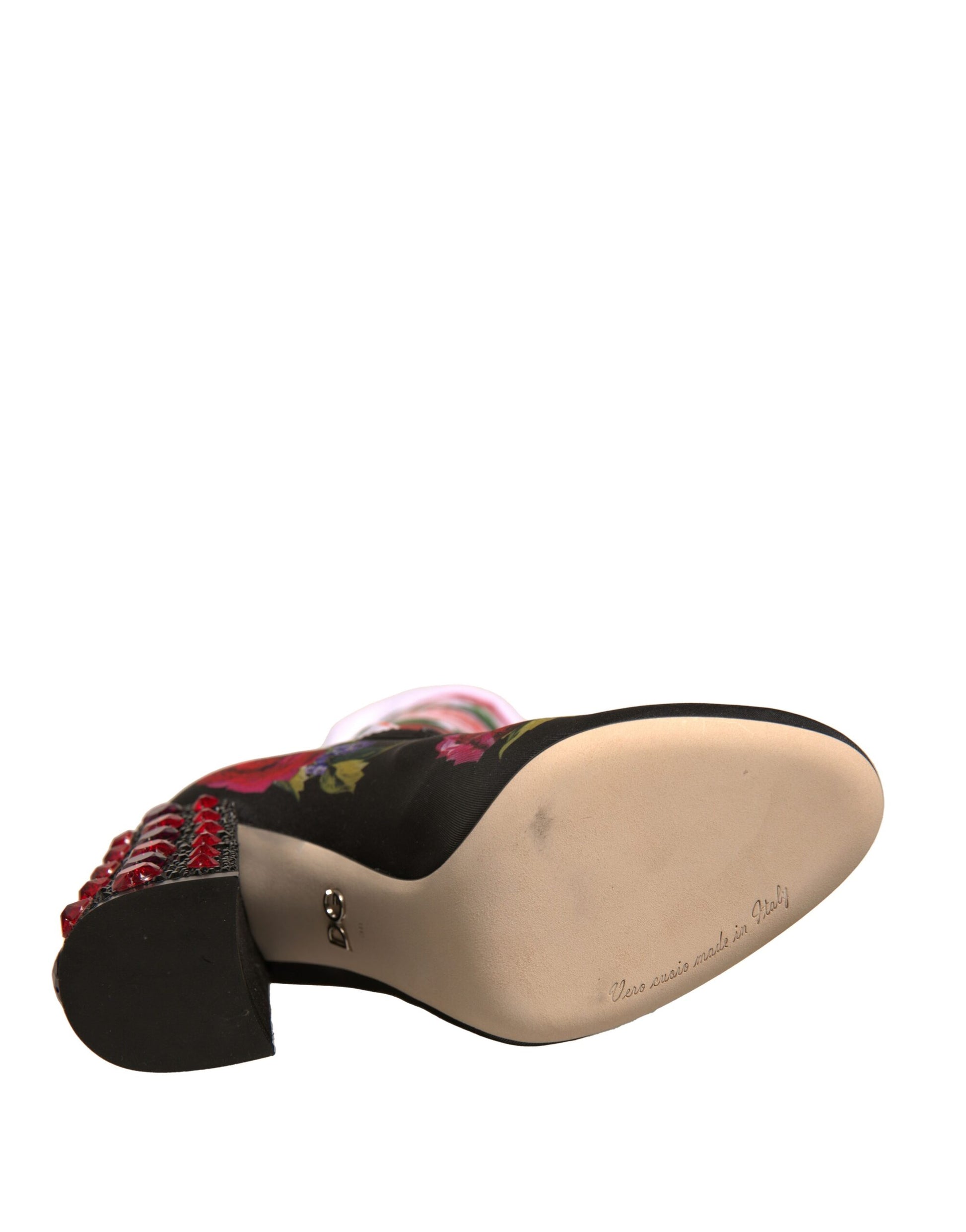 Pair of women's shoes with floral pattern on toe cap