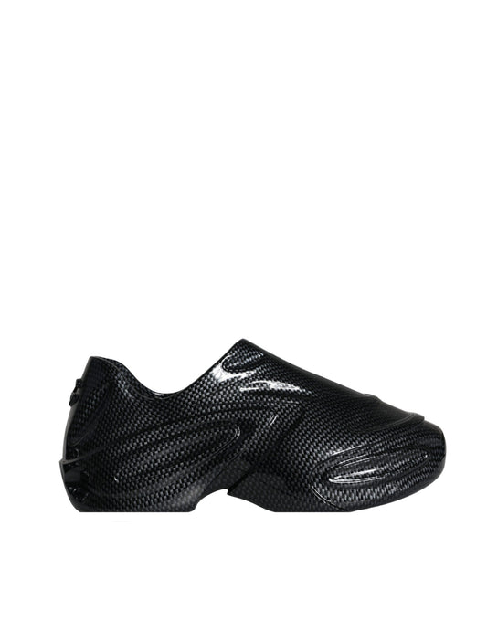 Black shoe with a high top and laces