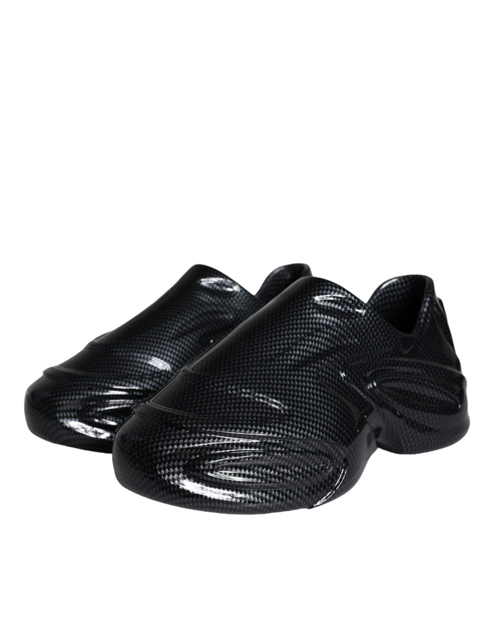 Pair of black ballet flats with a glossy finish