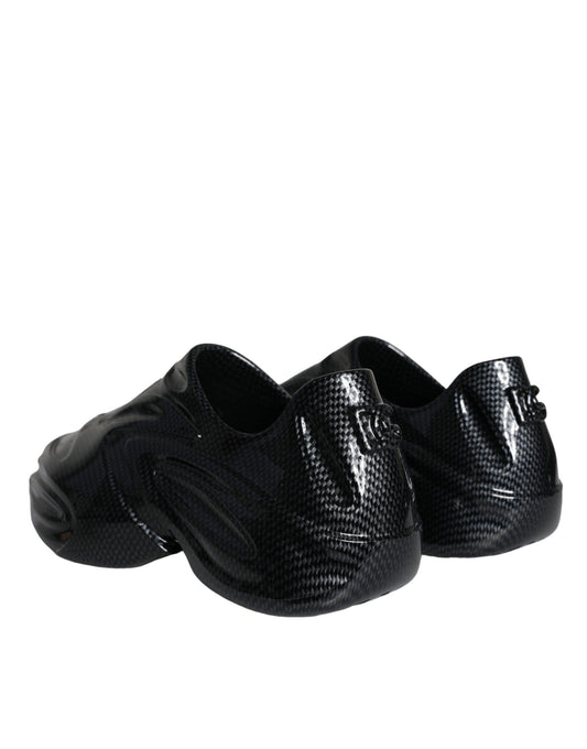 Pair of black athletic shoes with a patterned texture
