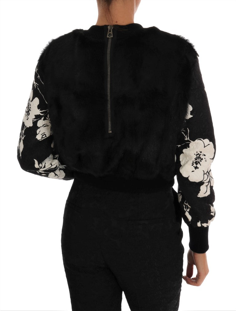 Black jacket with white floral pattern on back
