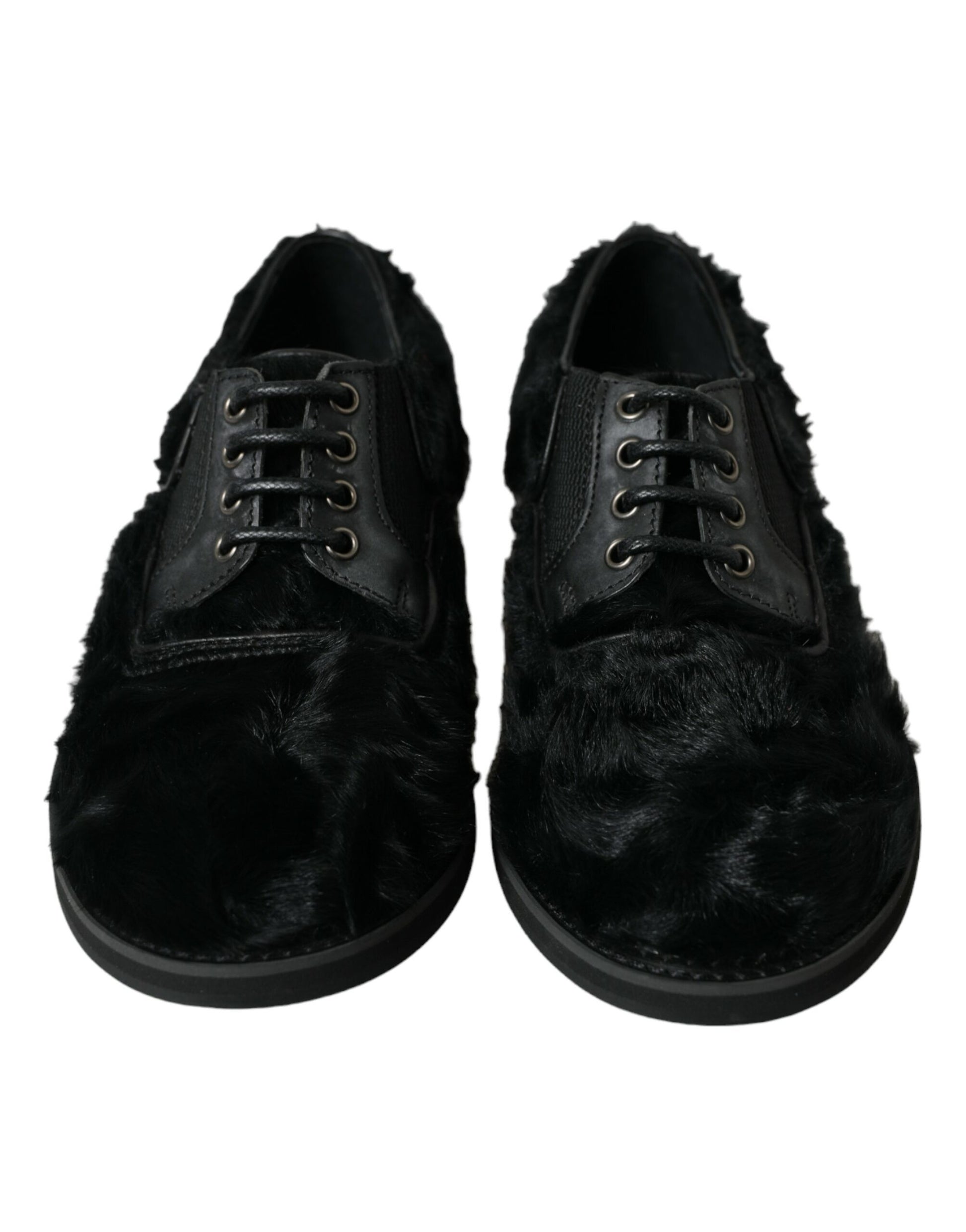 Pair of black velvet shoes with fur trim and laces