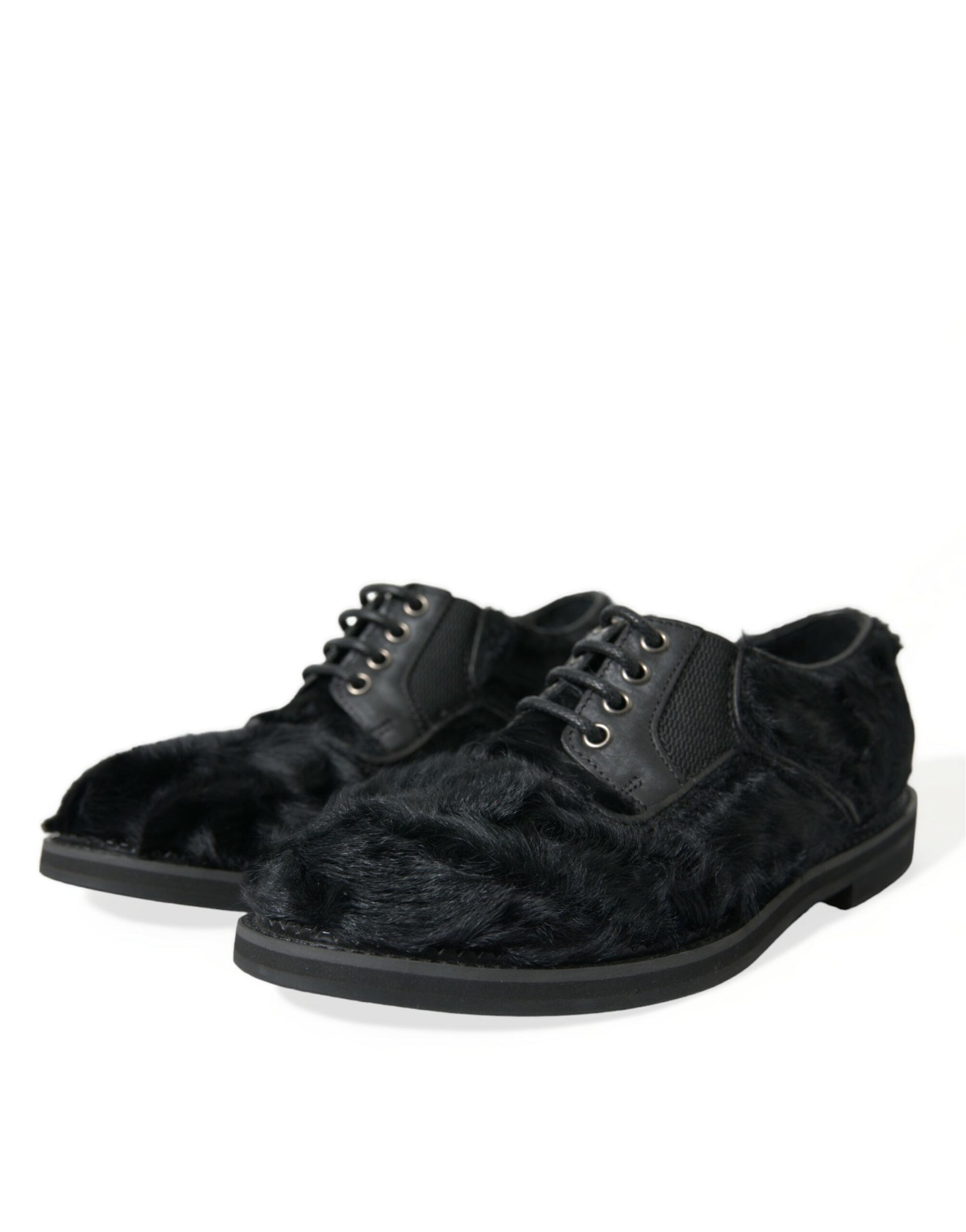 Pair of black velvet shoes with laces and buckles