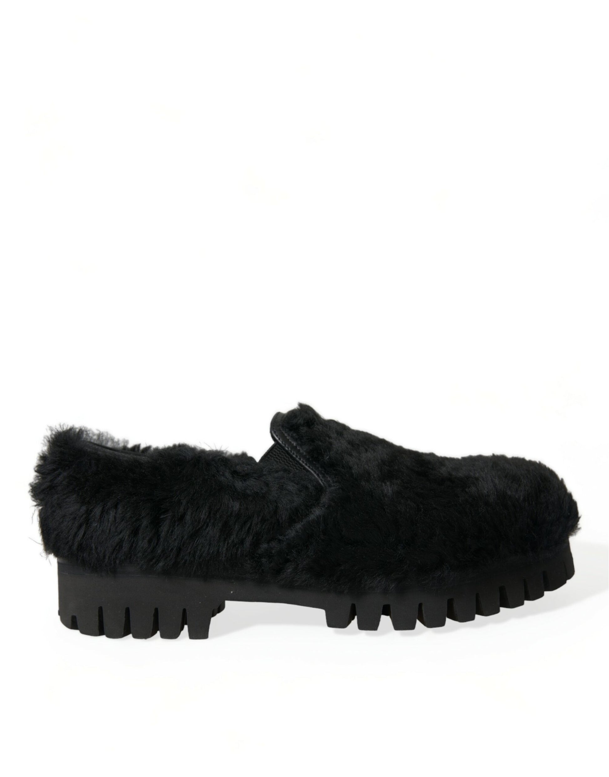 Fur lined slipper with a black sole and heel