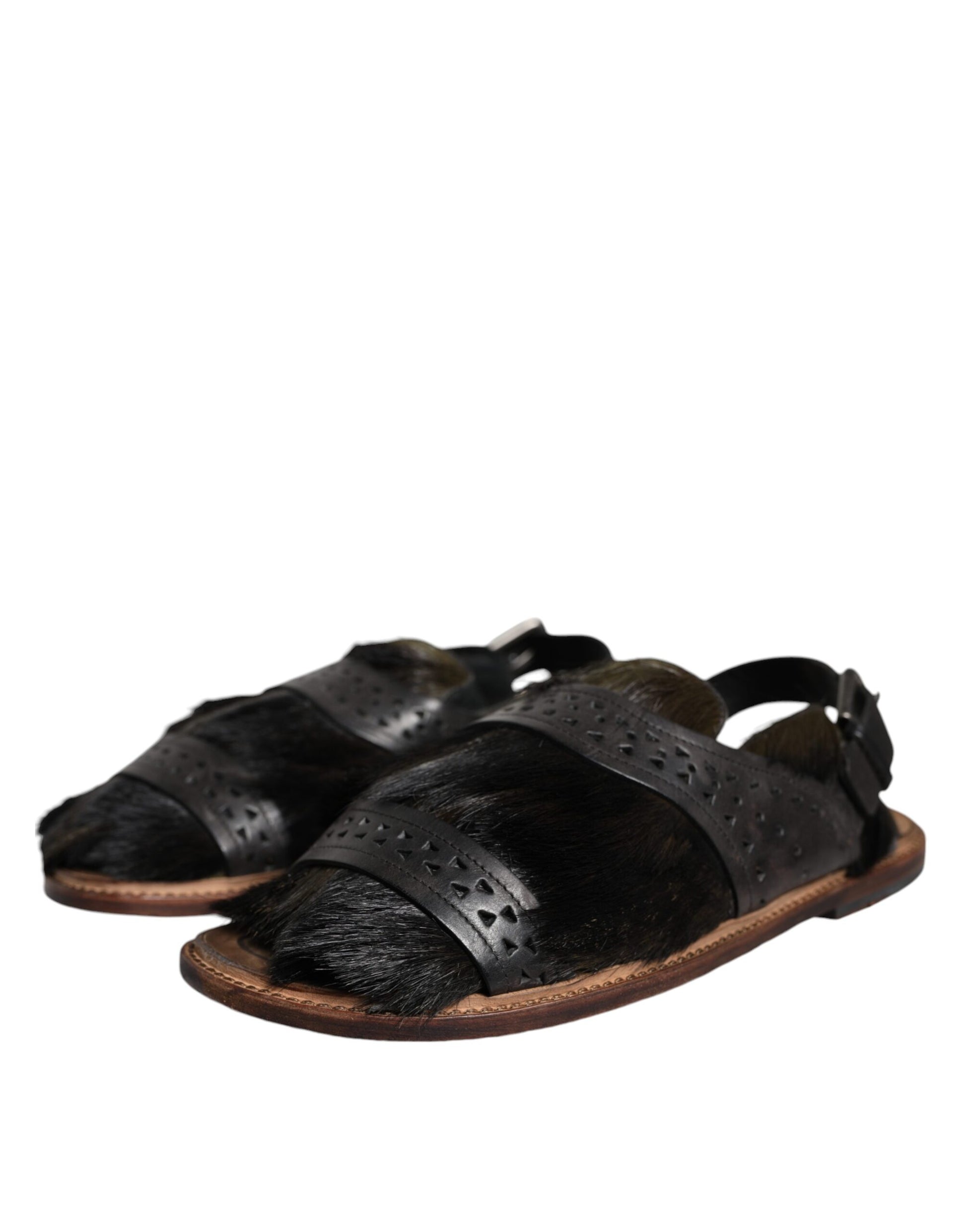 Pair of black sandals with brown straps