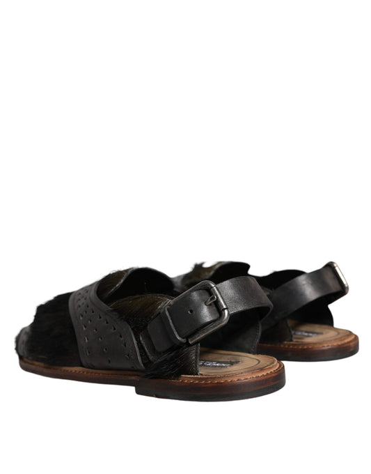 Pair of brown leather sandals with black straps