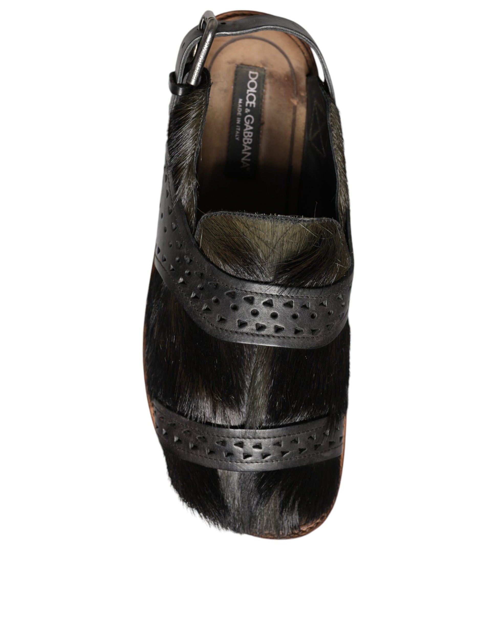 Brown shoe with fur trim and metal studs