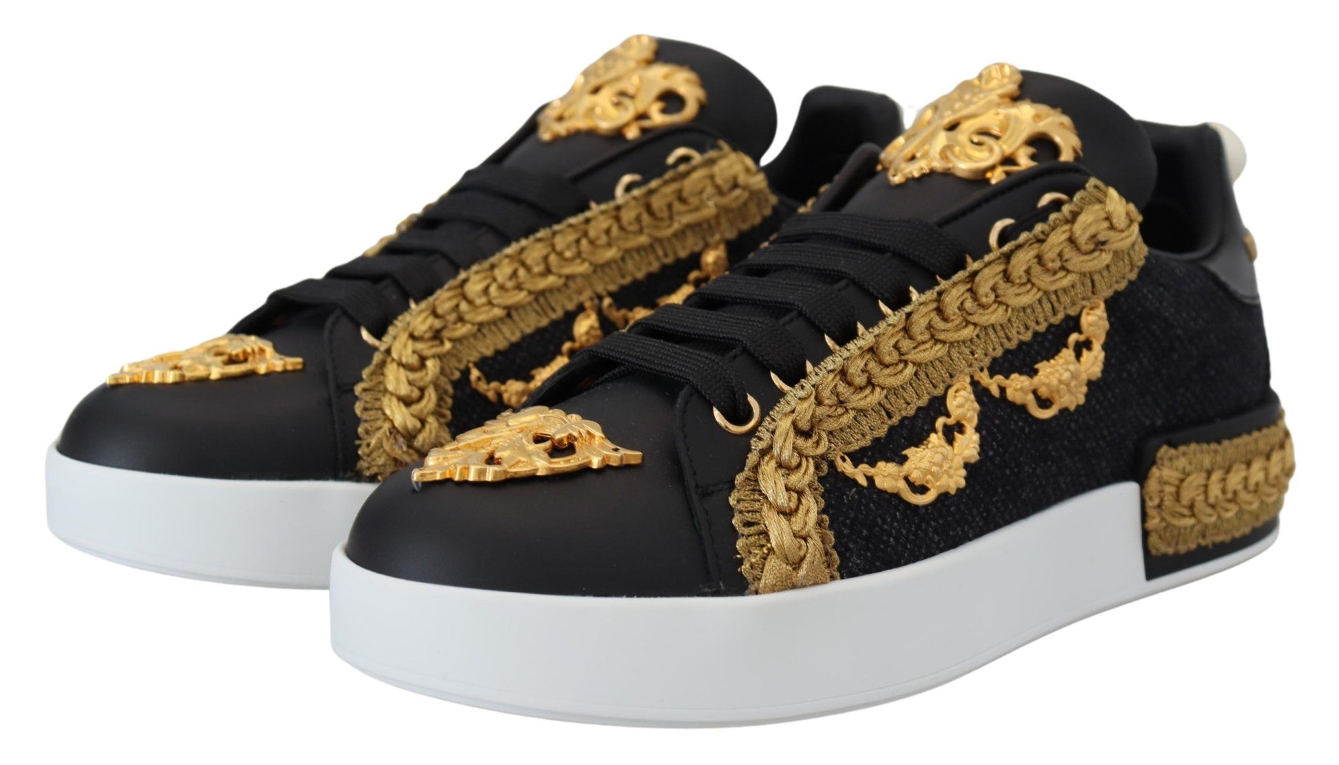 Black gold leather sneakers with baroque design, featuring laces and embellishments