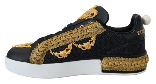 Black sneakers with gold accents, featuring a baroque design and embellished details
