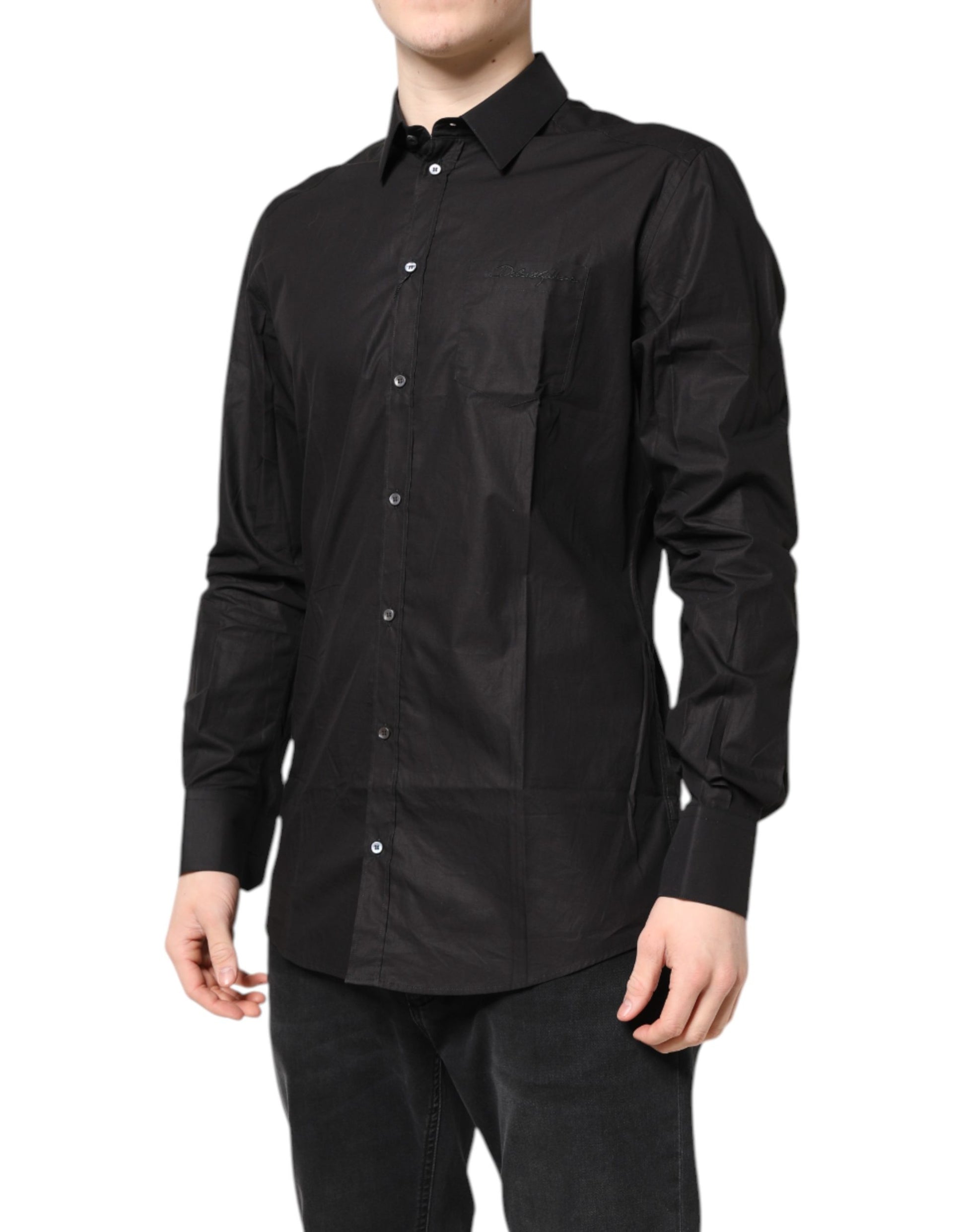 A black collared dress shirt with gold accents from the brand Dolce & Gabbana