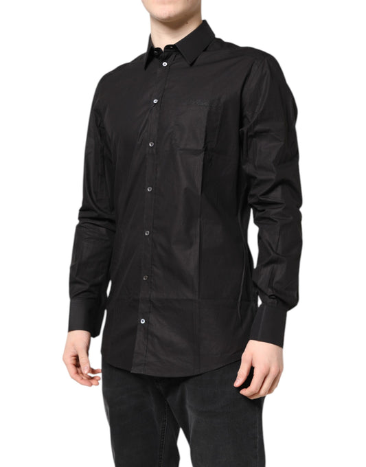 A black collared dress shirt with gold accents from the brand Dolce & Gabbana