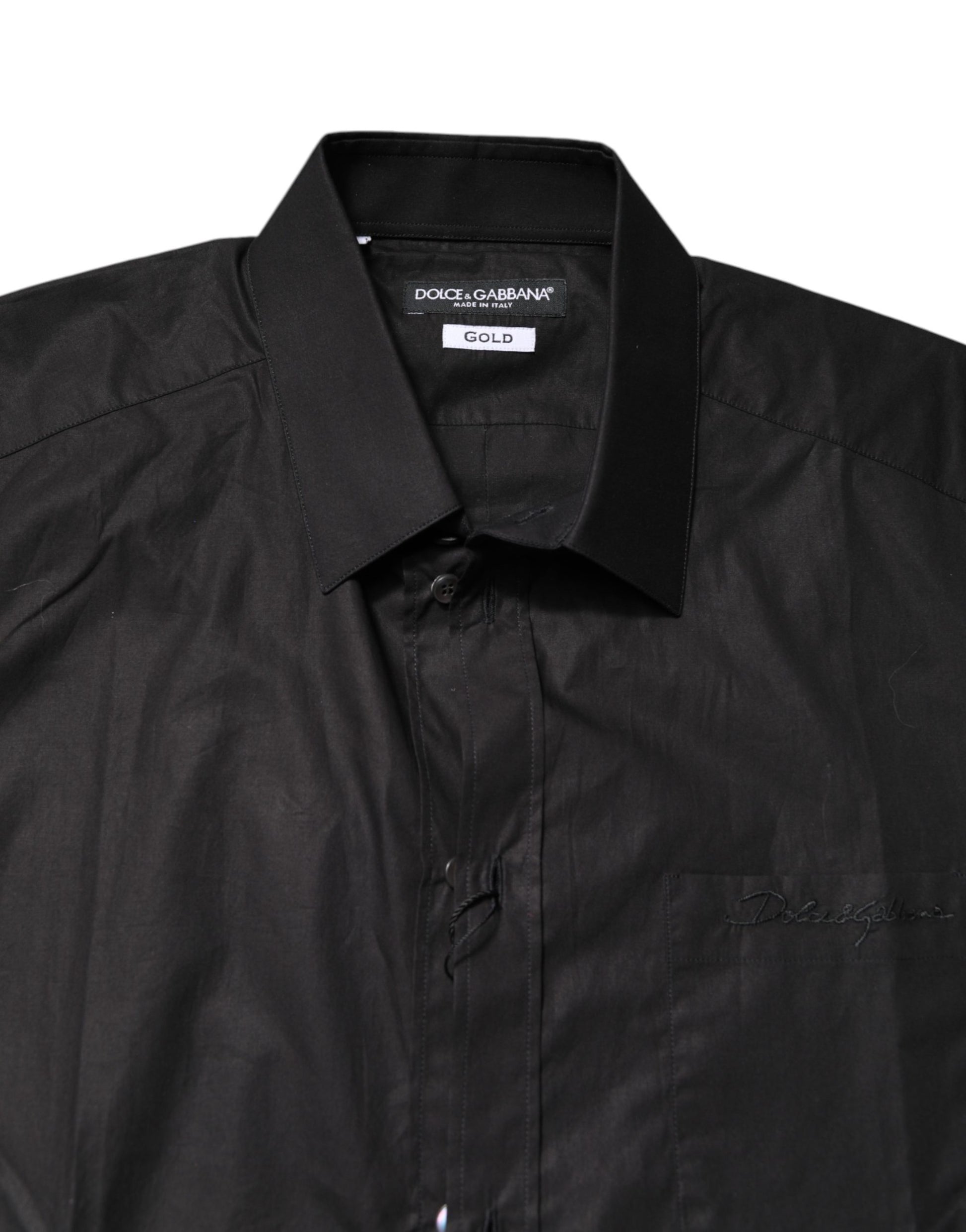 A black collared formal dress shirt with gold accents by Dolce & Gabbana