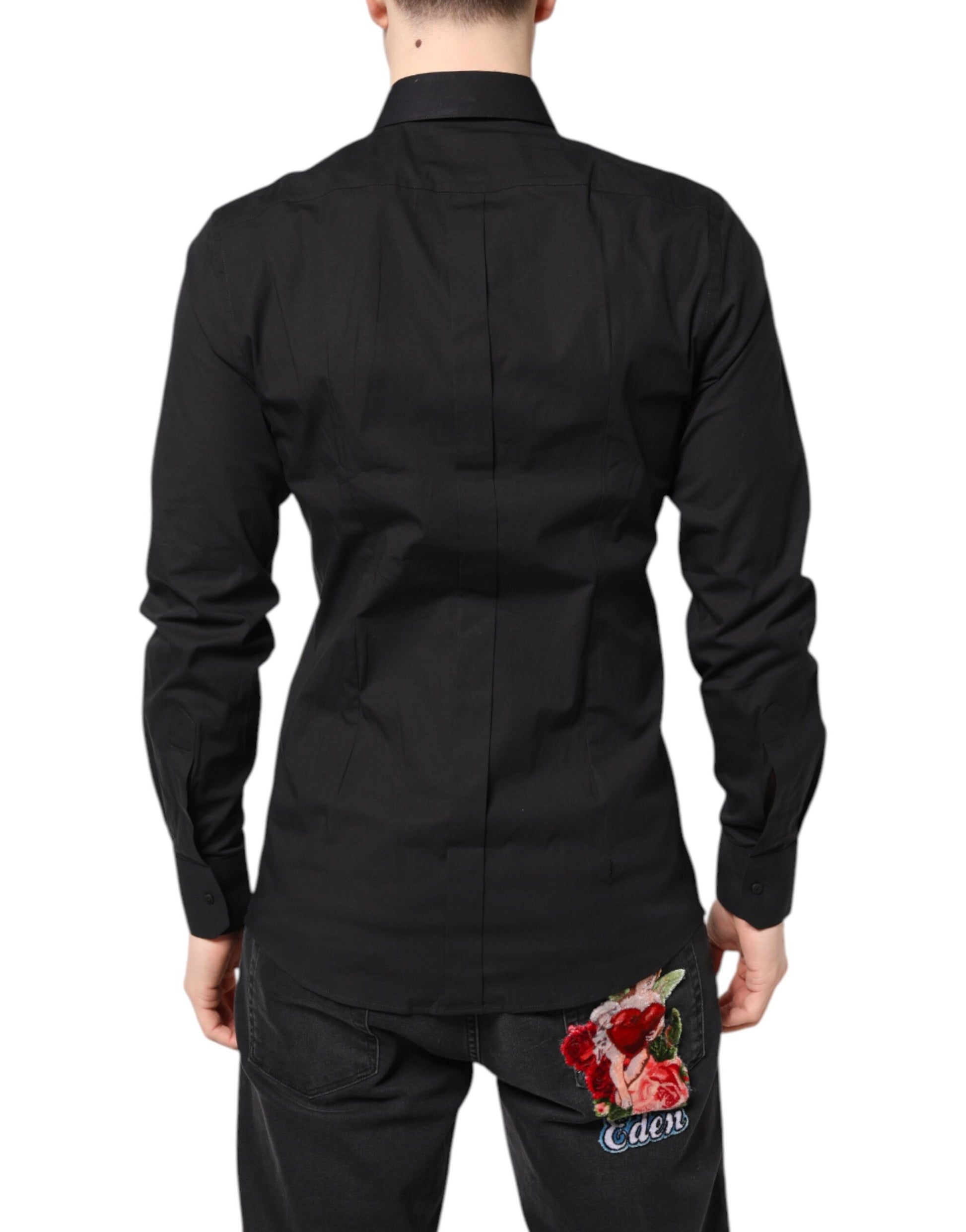 A black dress shirt with gold accents, featuring a floral embroidery on the back