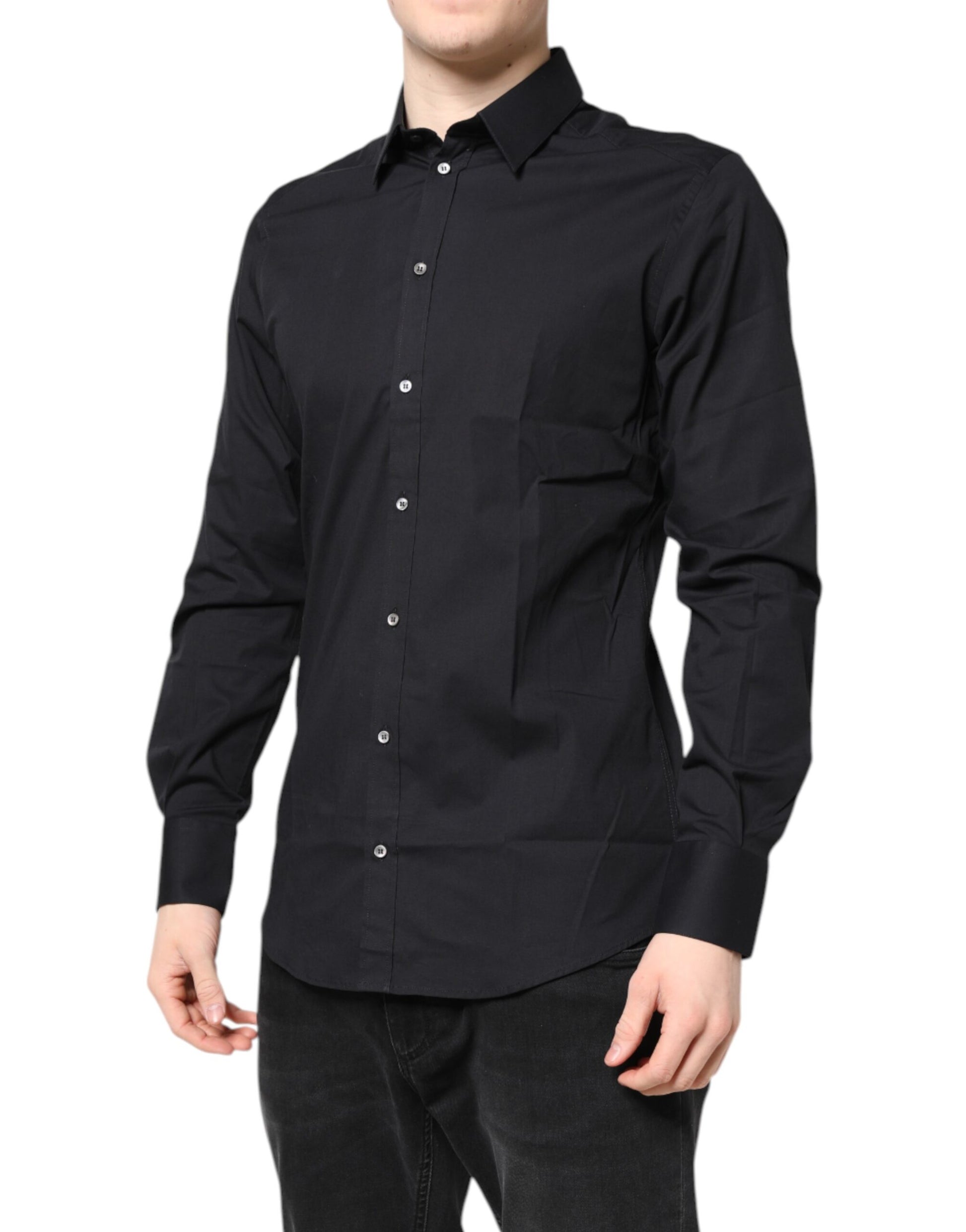 A black long sleeve dress shirt with gold accents from the brand Dolce & Gabbana