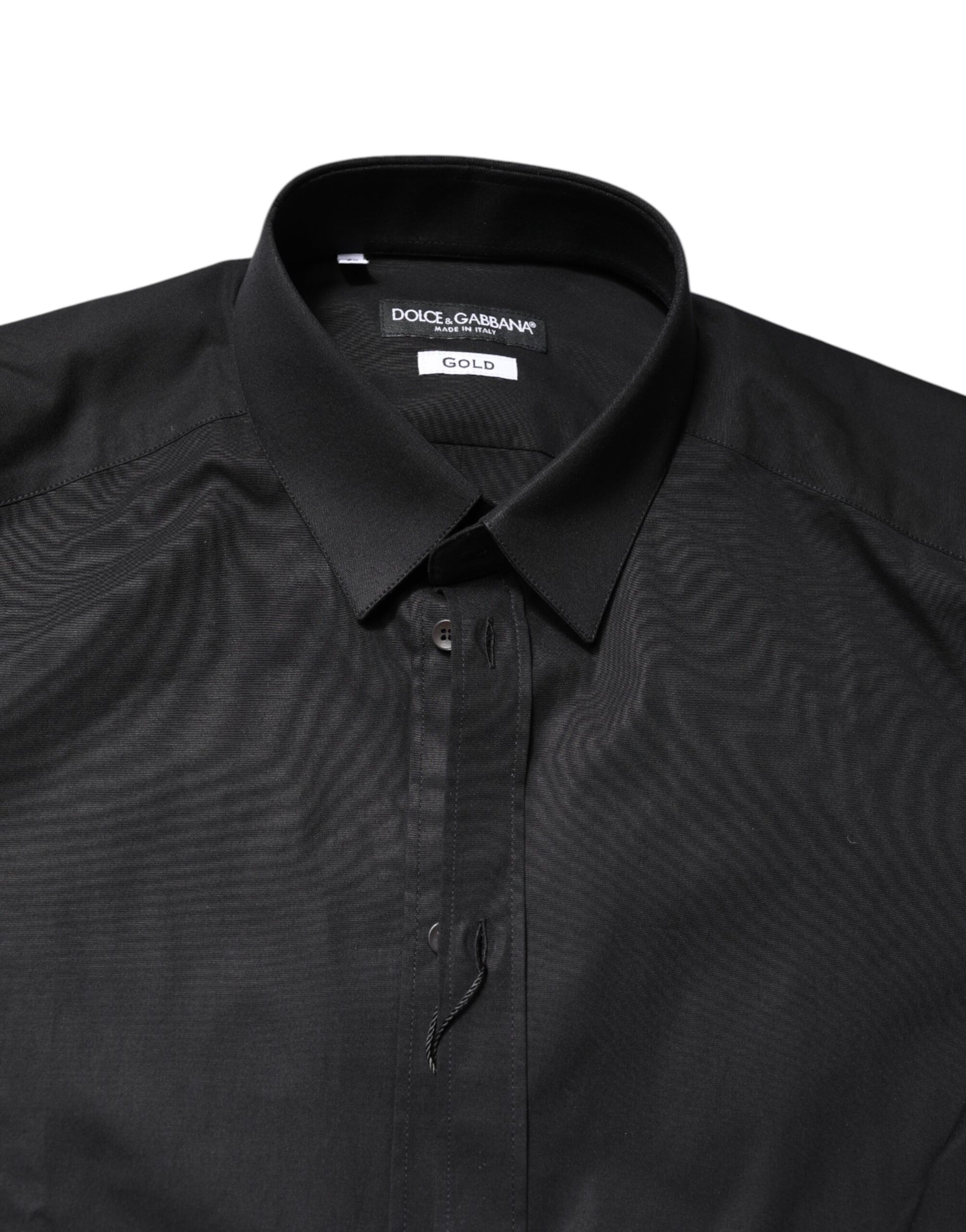 A black long sleeve dress shirt with gold accents from Dolce & Gabbana
