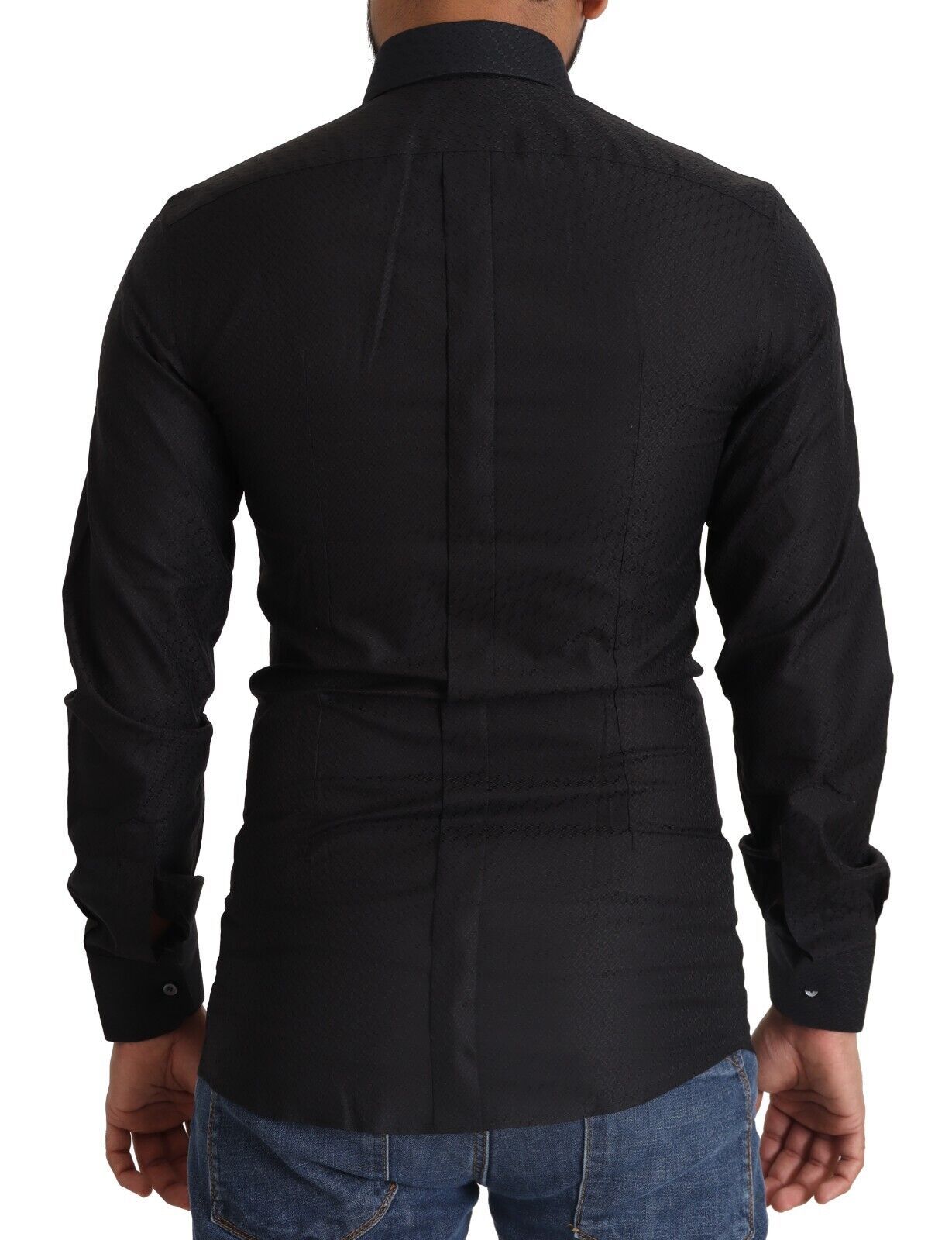 A black dress shirt with gold accents, designed by Dolce & Gabbana. It is made of cotton and features slim fi