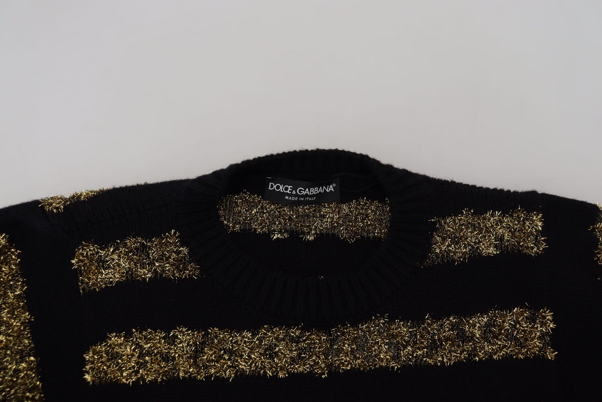 Black sweater with gold sequins