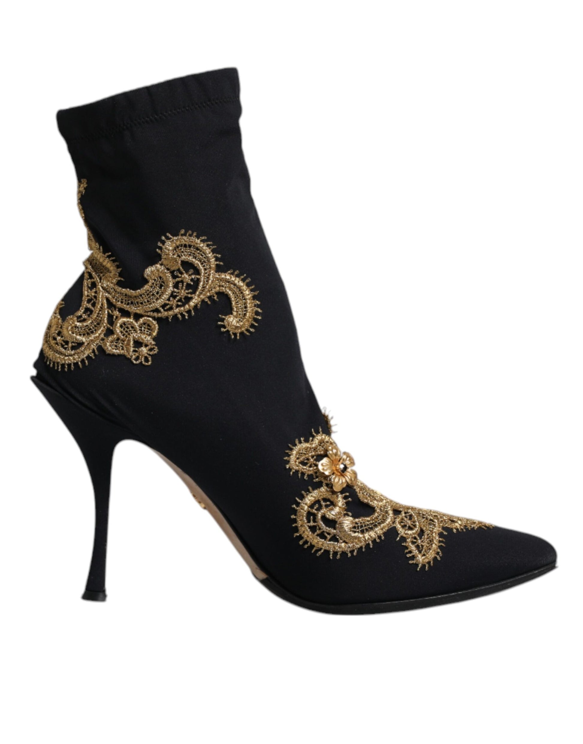 Black boot with gold embroidery on heel