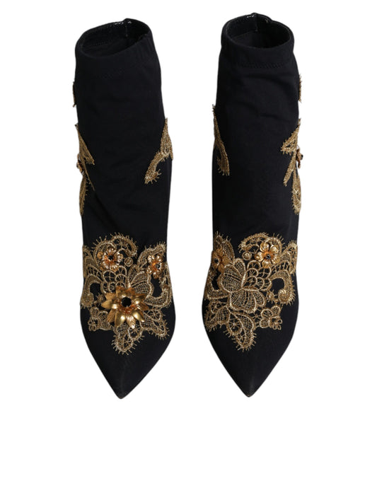 Pair of black socks with gold embroidery