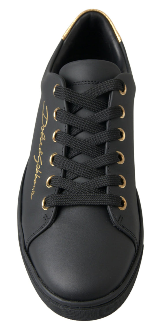 Black sneaker with gold laces