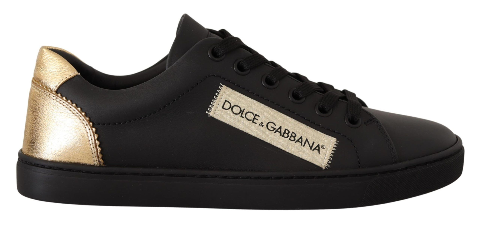 Black and gold sneaker with white laces and a logo on the side