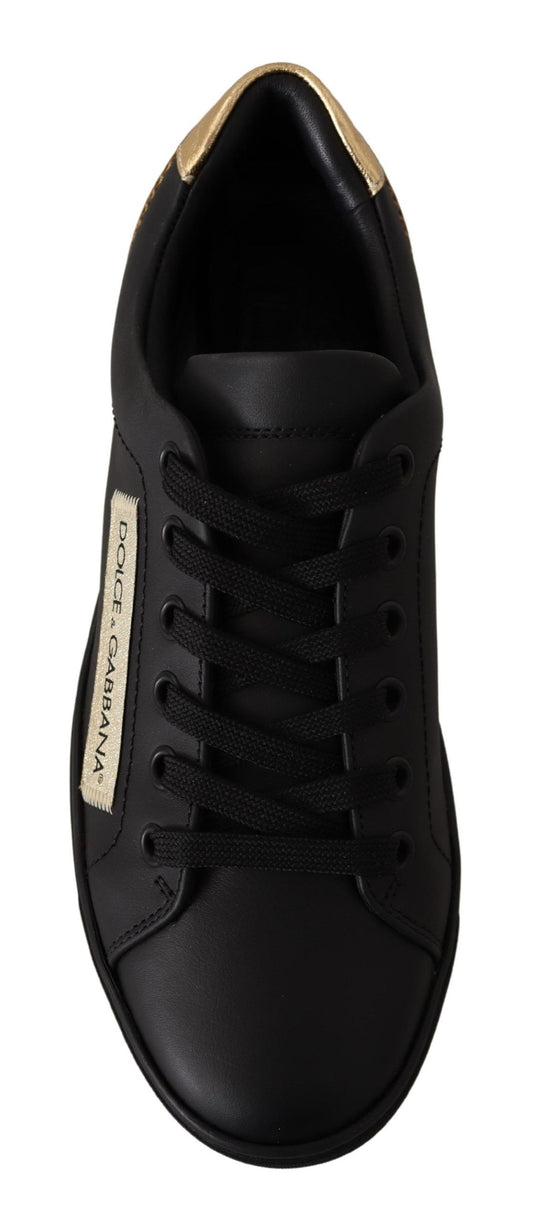 Black sneaker with gold accents and a white label on the side