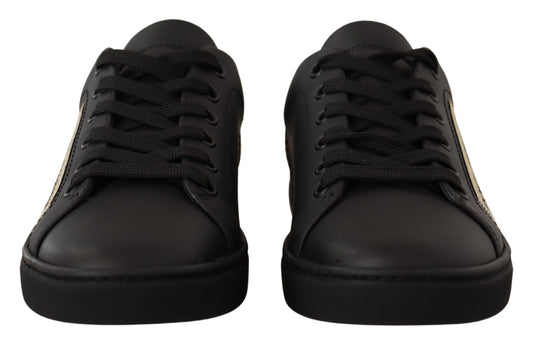 Pair of black sneakers with white laces