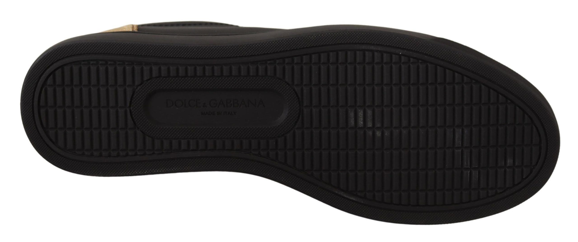 Pair of black athletic shoes with white laces and soles