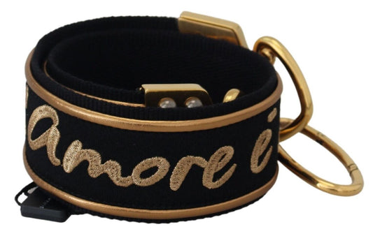 Black bracelet with gold lettering reading "amore"