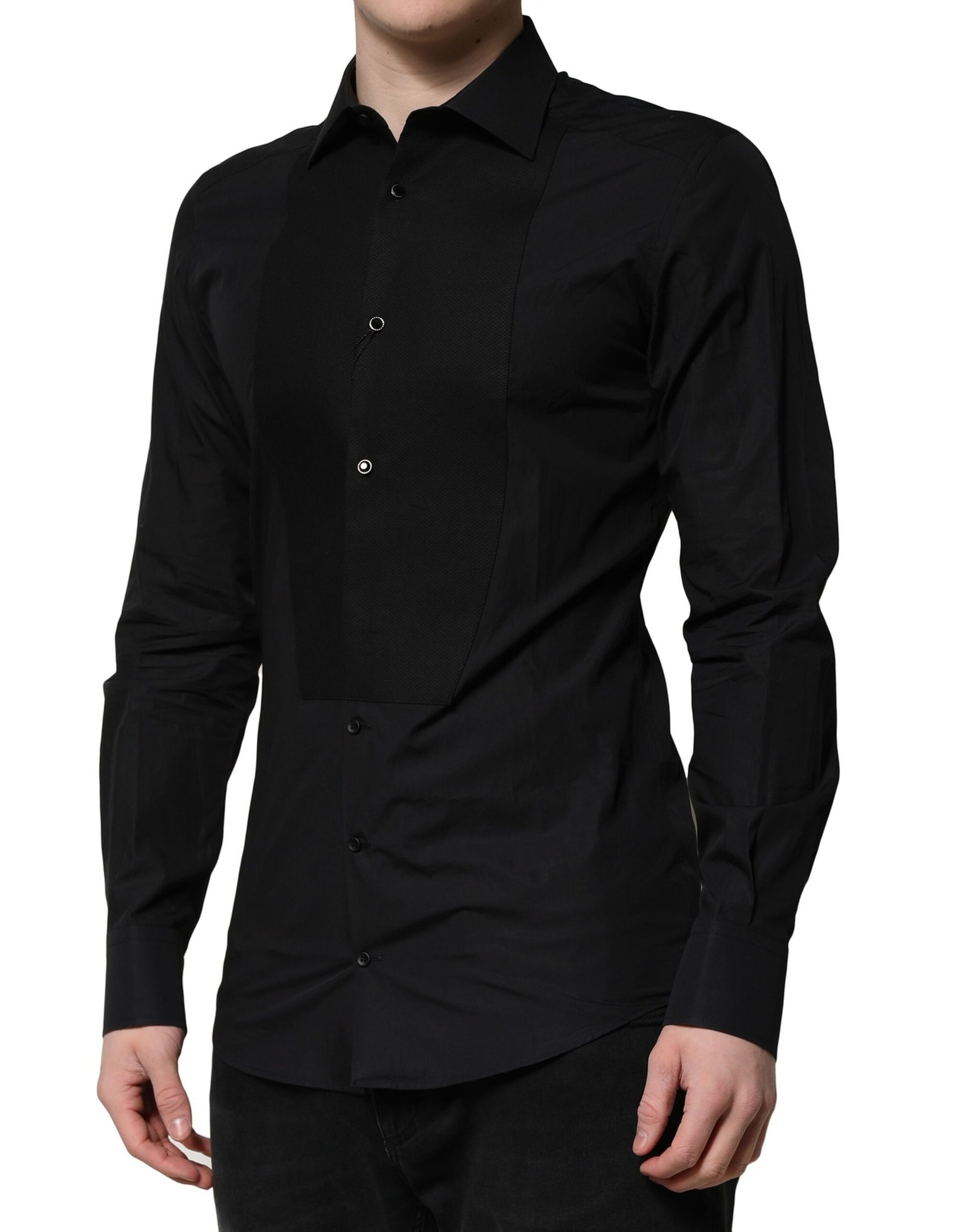 A black long sleeve dress shirt with gold buttons and a V-neck