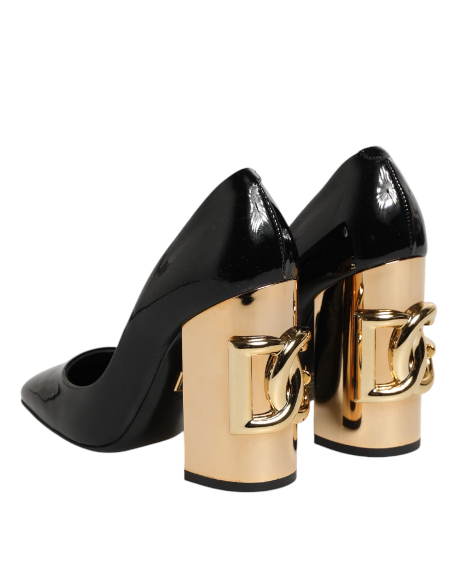 Black high heel shoes with gold accents