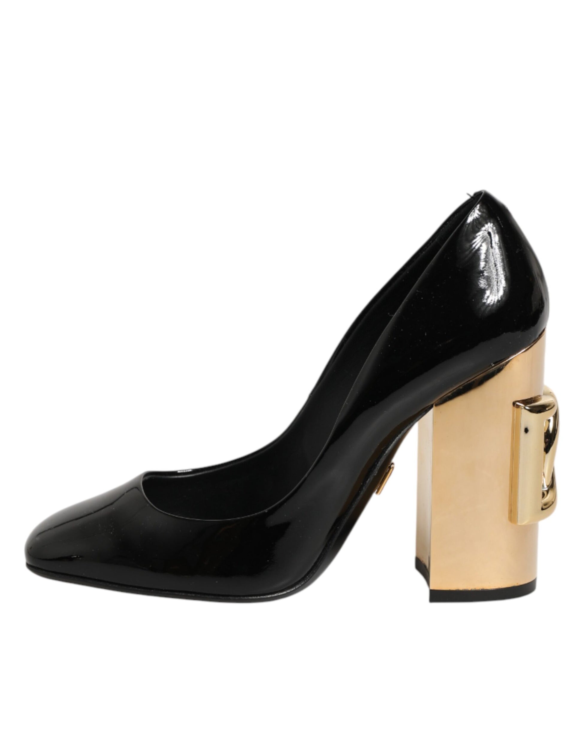 Black high heel shoe with gold accents