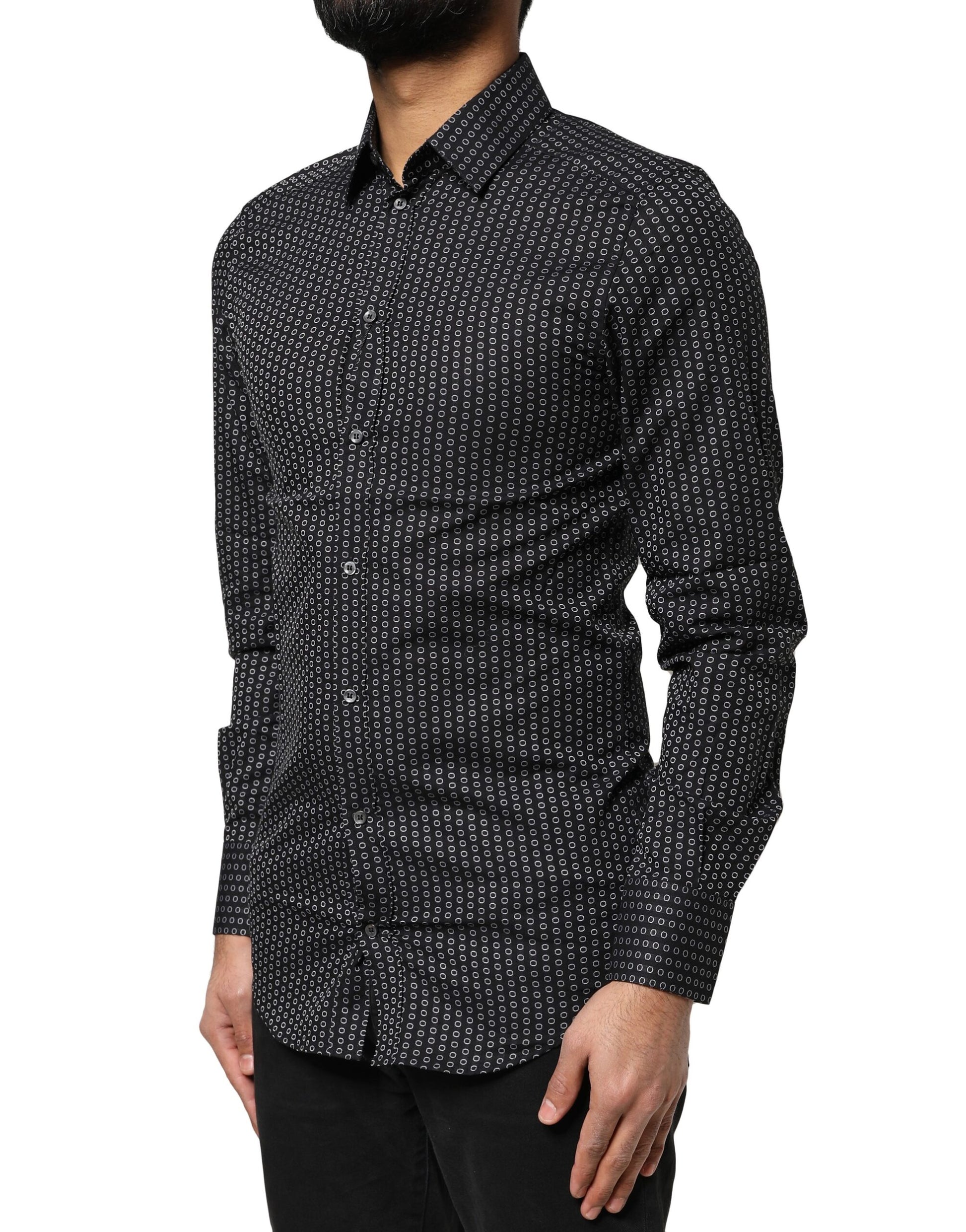 A black dress shirt with a gold pattern, featuring long sleeves and a collar
