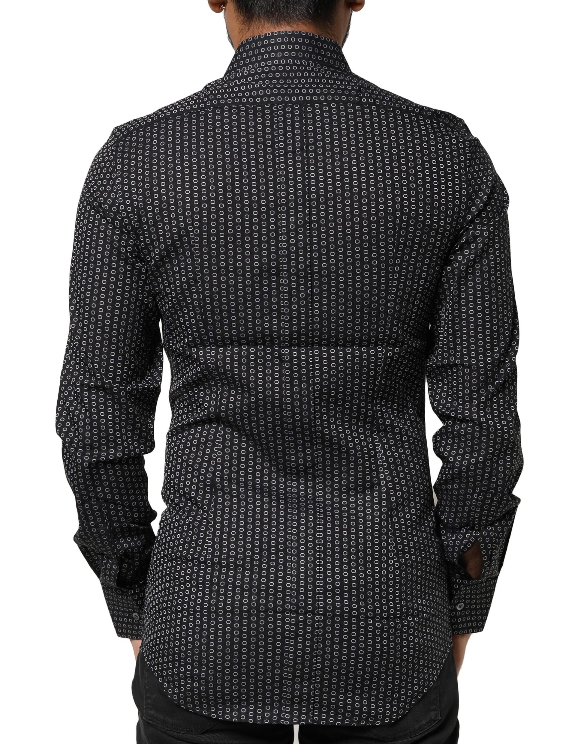 A black dress shirt with a gold pattern, featuring a collar and long sleeves