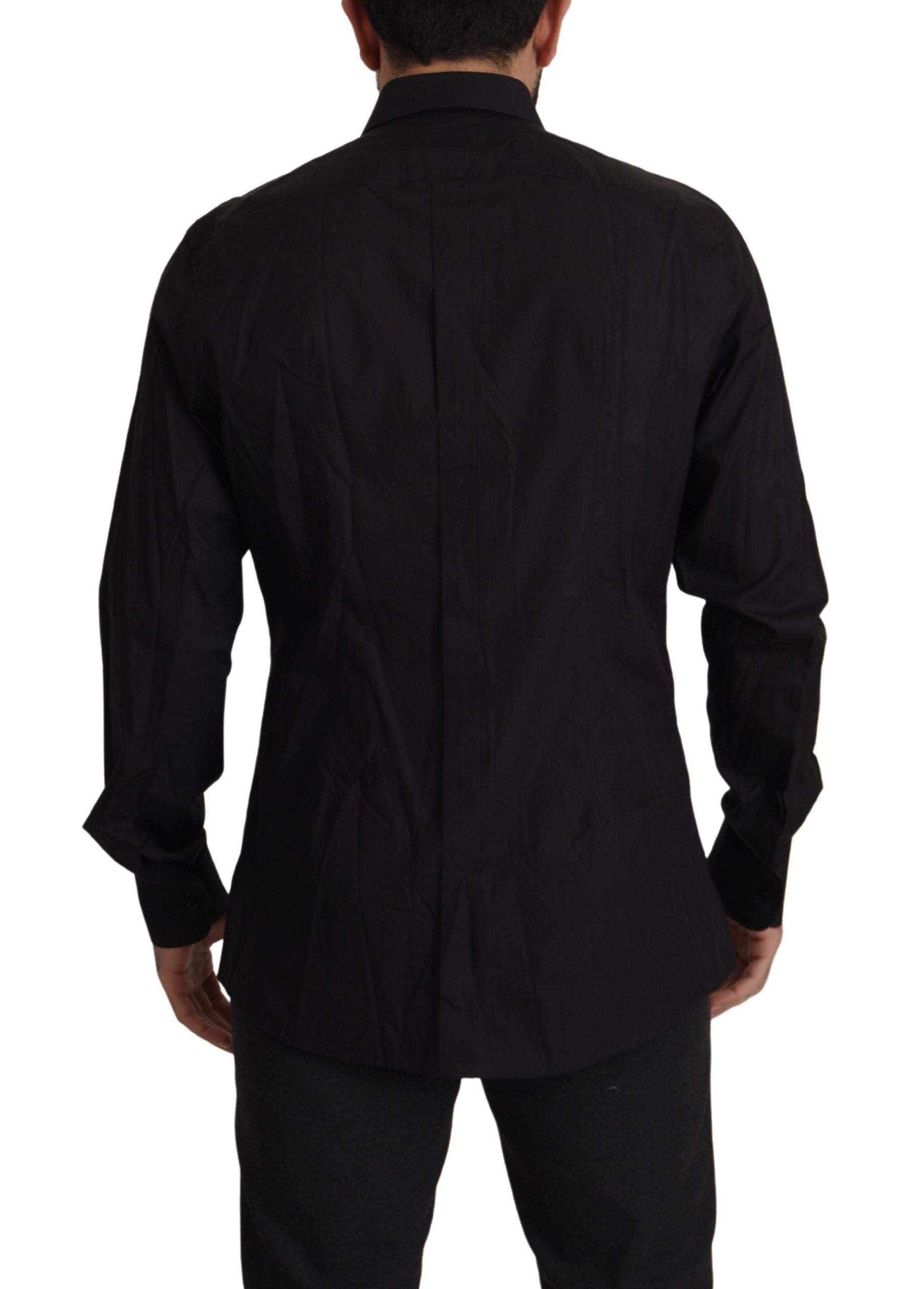 A black slim fit tuxedo dress shirt with gold accents