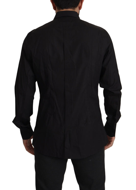 A black slim fit tuxedo dress shirt with gold accents