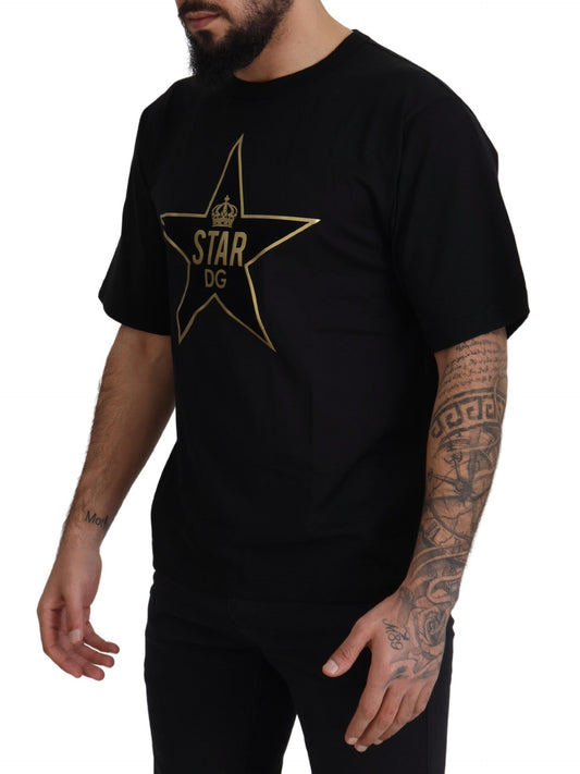 Man wearing black t-shirt with gold star logo