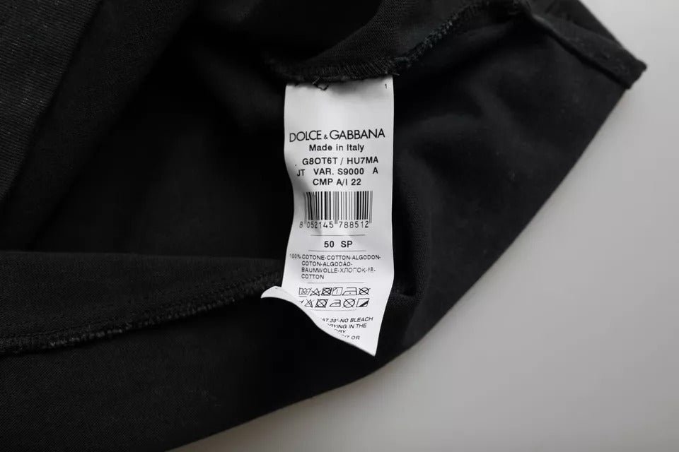 Black jeans on a white surface