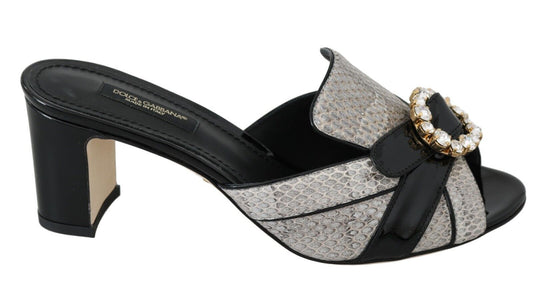Black high heel sandal with rhinestones and a bow on the toe