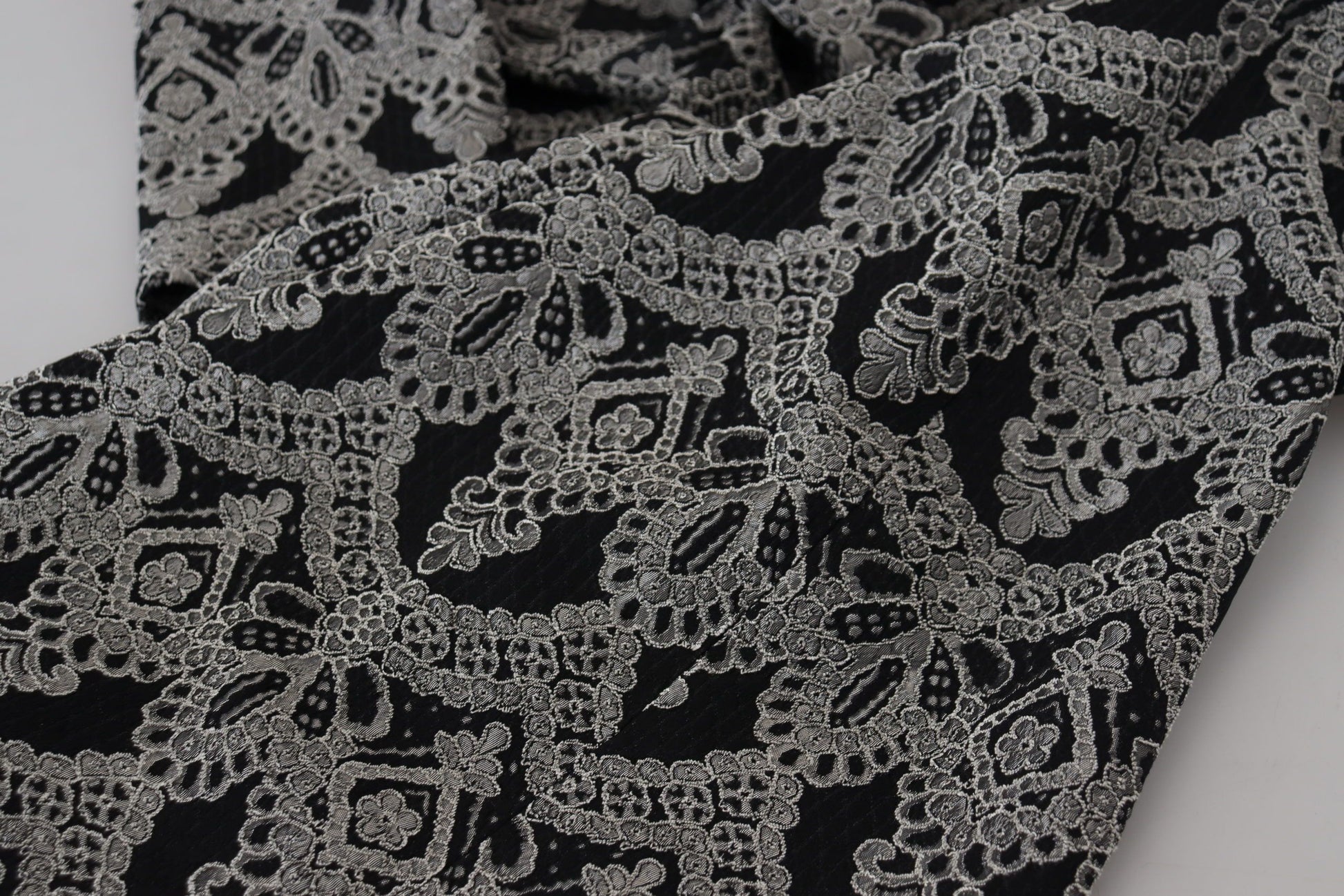 A black gray jacquard sheath bodycon dress with lace detailing