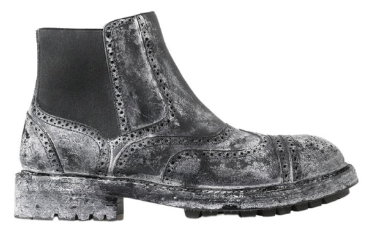 Black suede boot with silver glittery pattern and chunky heel