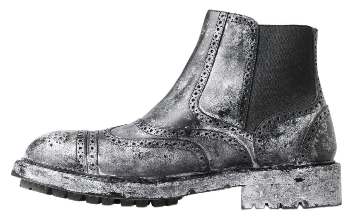 Pair of silver boots with decorative stitching and a chunky heel