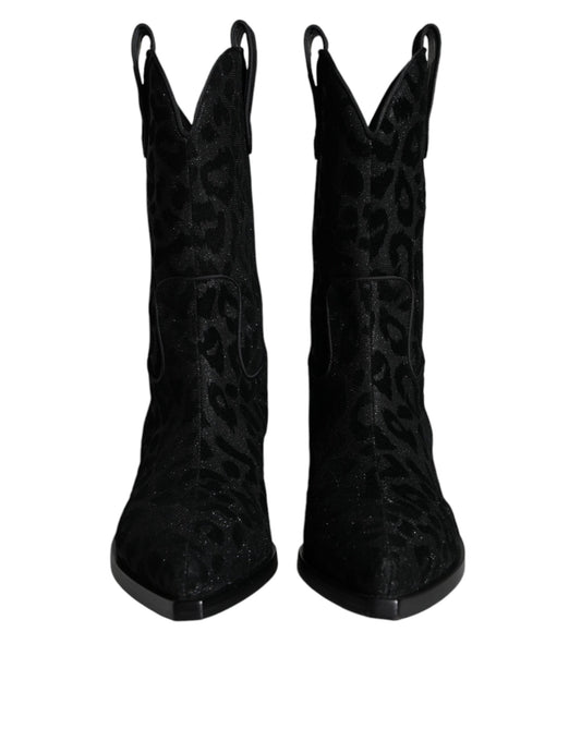 Pair of black boots with silver sequins