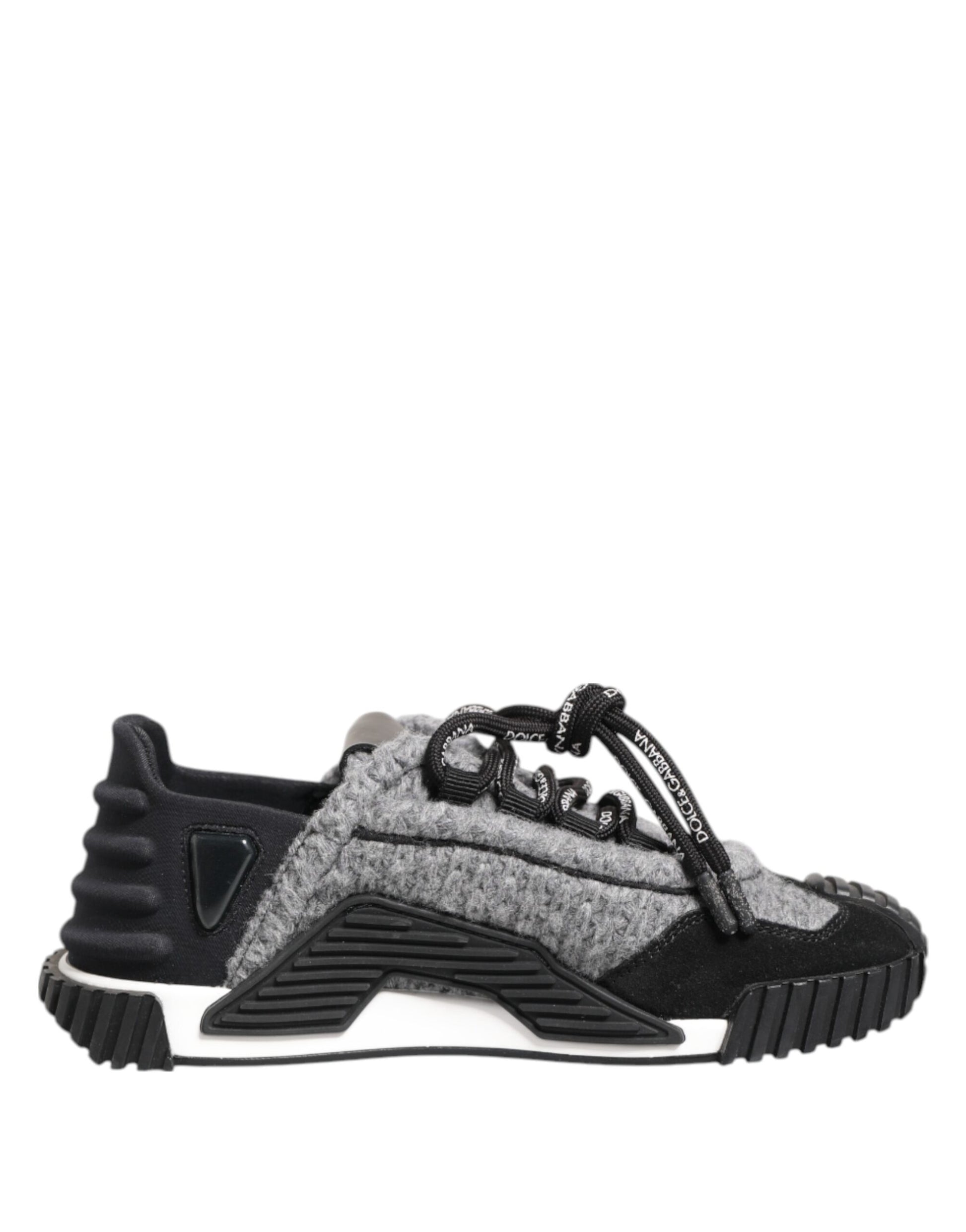 Grey and black baby shoe with white sole