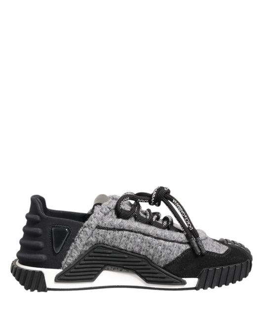 Grey and black baby shoe with white sole