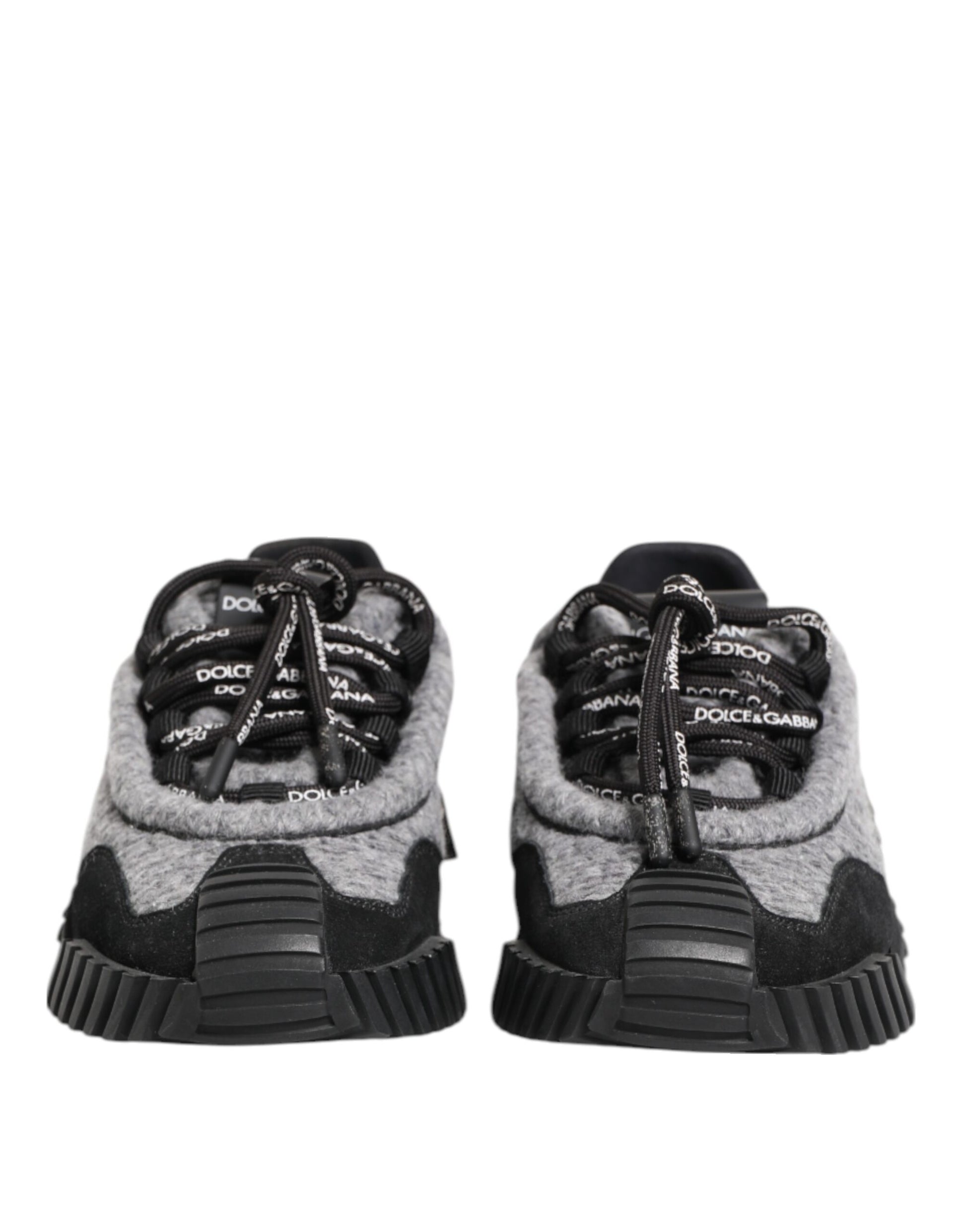 Pair of black and grey sneakers with white laces