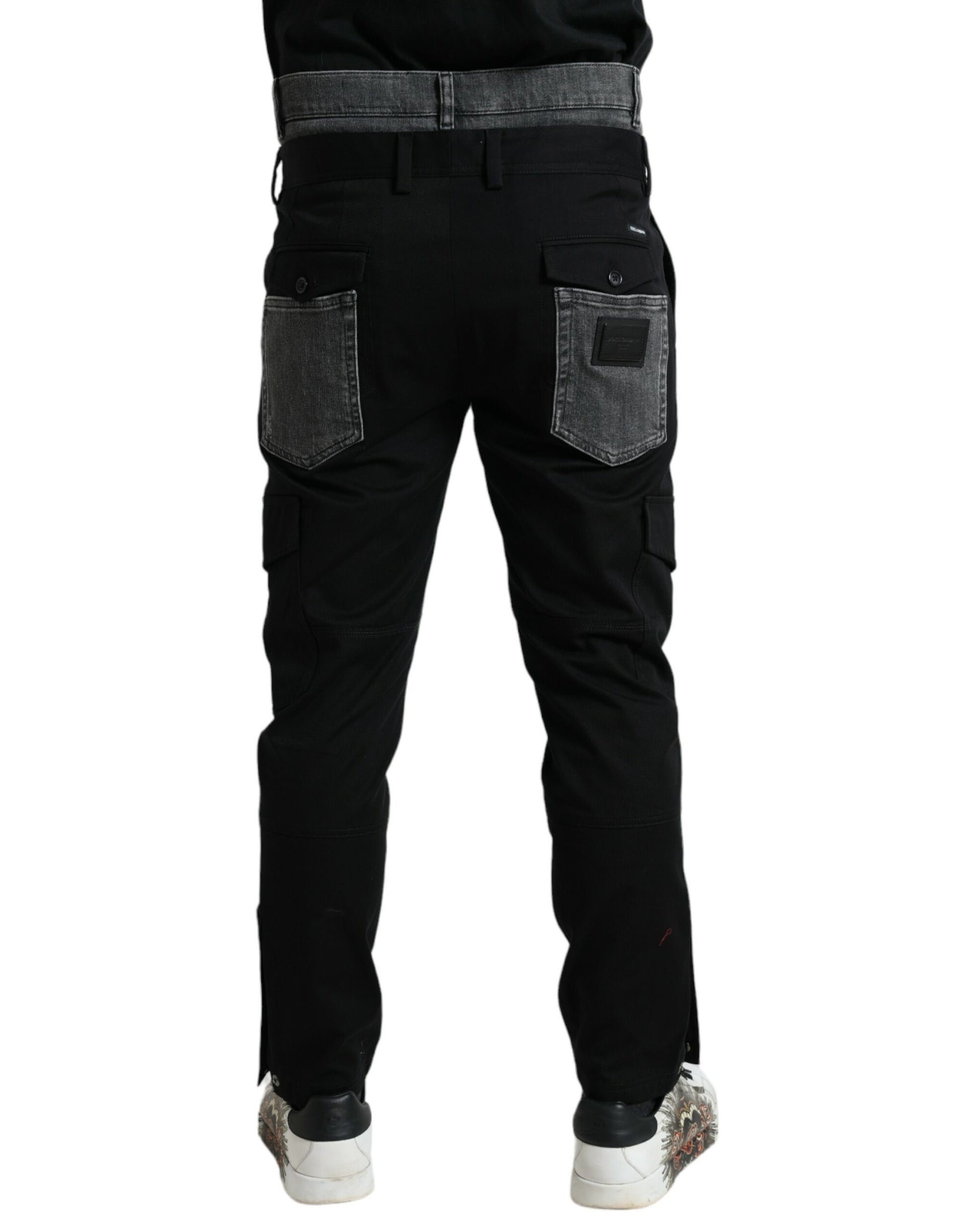 Pair of black cargo pants with pockets on sides