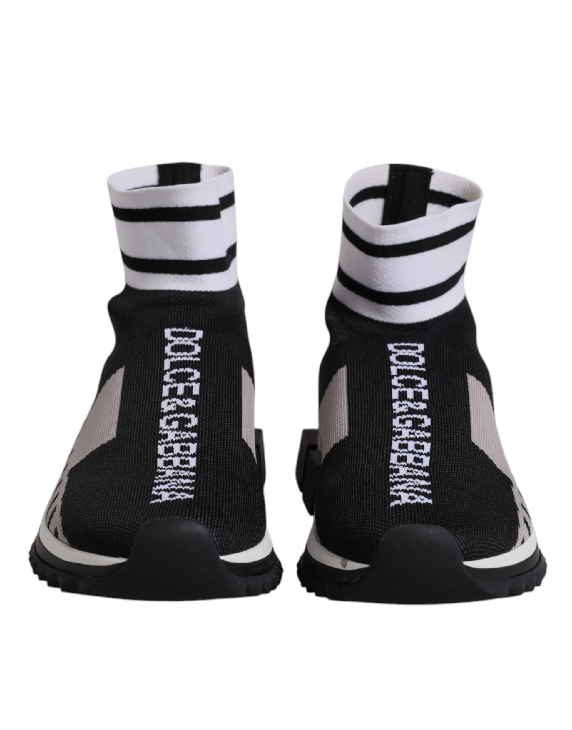 Pair of black, gray, and white sock-style sneakers with brand name on side